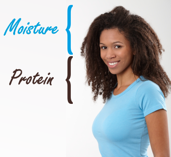 Black woman with long natural hair moisture in the roots protein on the ends