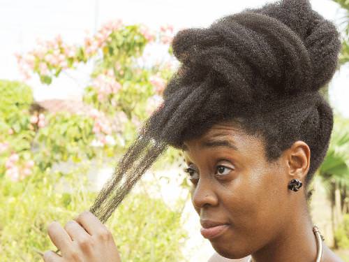 Woman looking at her hair