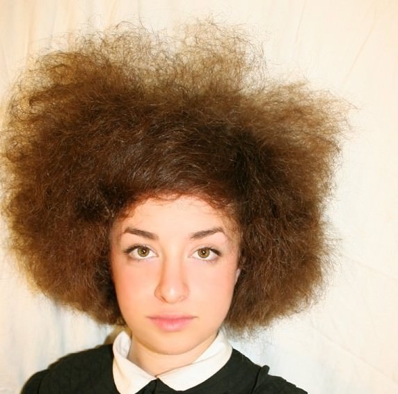 white woman with afro hair