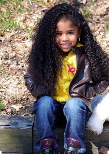 little girl with curly hair